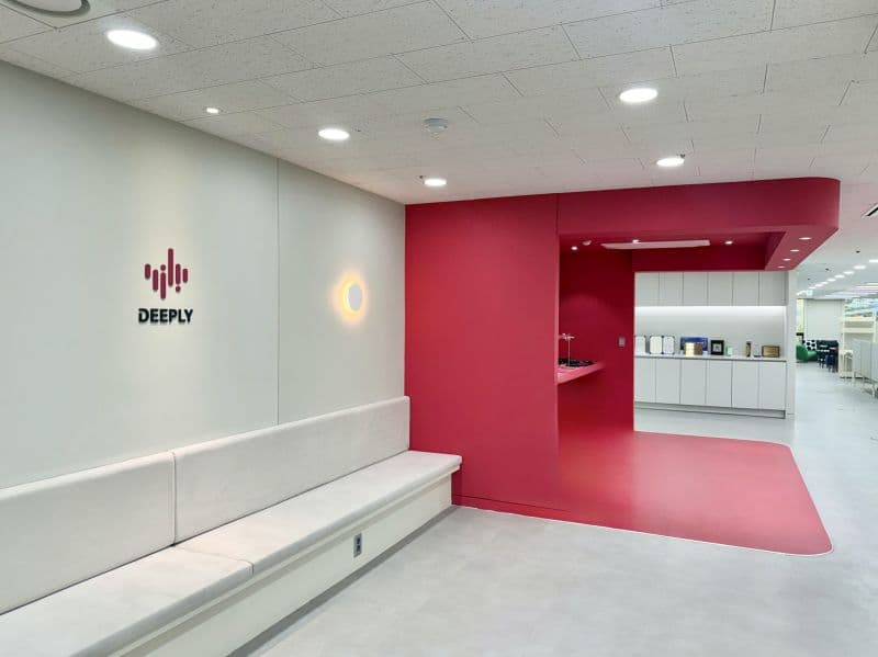 The new Deeply office entrance with its logo and brand colors